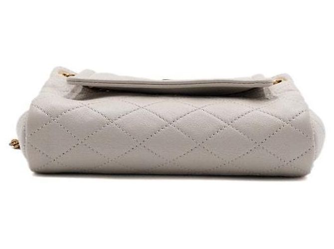 Saint Laurent Borsa a tracolla e spalla Nolita in pelle d'agnello crema con monogramma dorato Bianco - vista 7