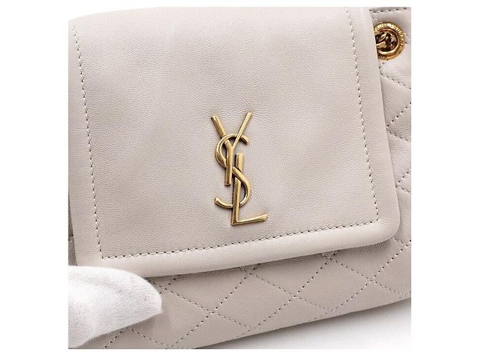 Saint Laurent Borsa a tracolla e spalla Nolita in pelle d'agnello crema con monogramma dorato Bianco - vista 8