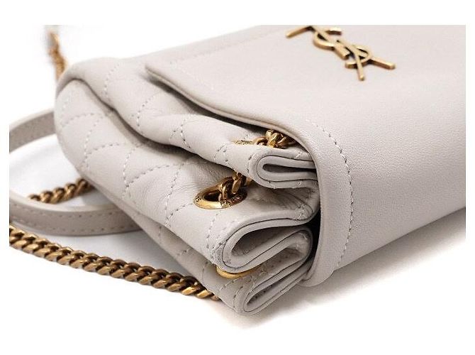 Saint Laurent Borsa a tracolla e spalla Nolita in pelle d'agnello crema con monogramma dorato Bianco - vista 9