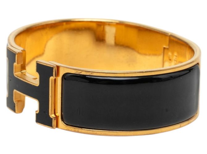 Hermès Pulseira Charm Hermes em Preto e Dourado - vista 2