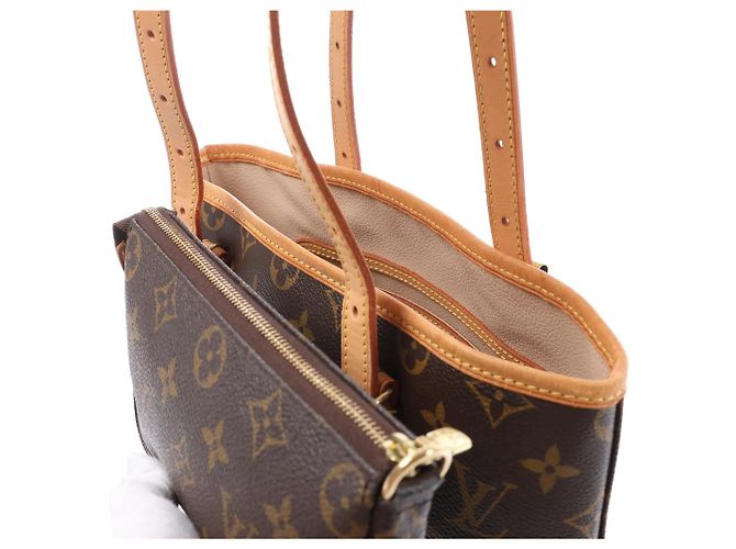 Borsa a tracolla Louis Vuitton Bucket GM Monogram Canvas in marrone Beige - vista 4
