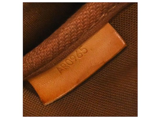 Louis Vuitton Saumur Monogram 35 Marrone - vista 5