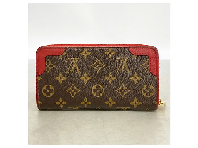 Louis Vuitton Monogram Zippy Wallet Retiro Marrone Fuschia - vista 9