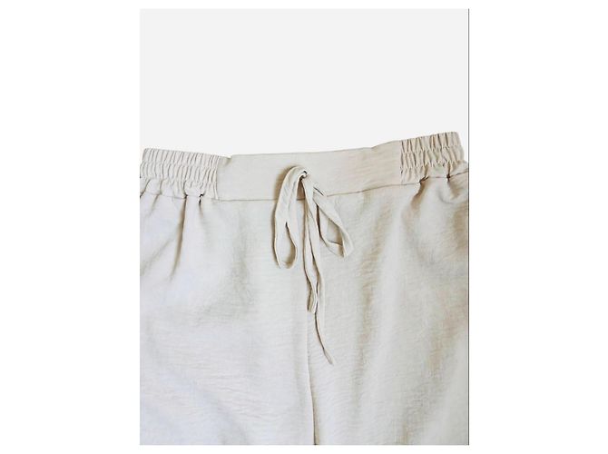Massimo Dutti Conjunto de crop top e calças largas bege - vista 9