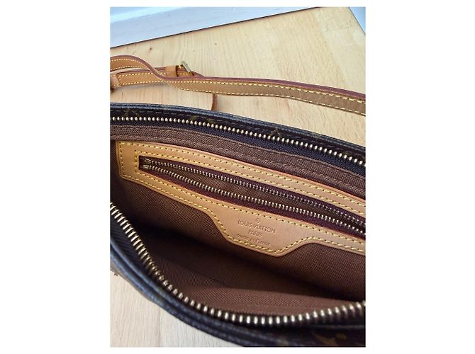 Louis Vuitton Trotteur Fine Trotter Castaño - vista 6