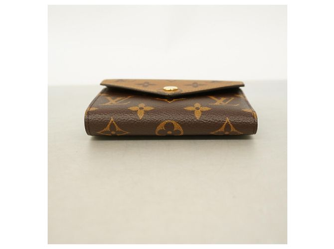 Cartera Louis Vuitton Tri-fold Castaño - vista 2