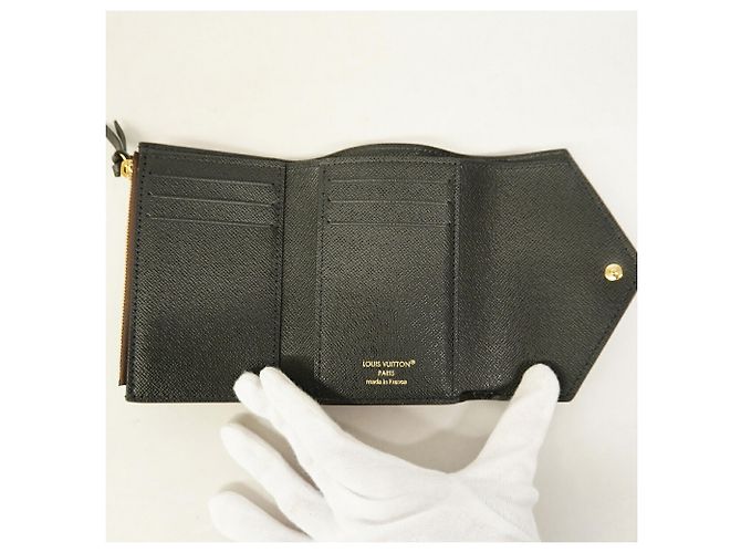 Cartera Louis Vuitton Tri-fold Castaño - vista 3
