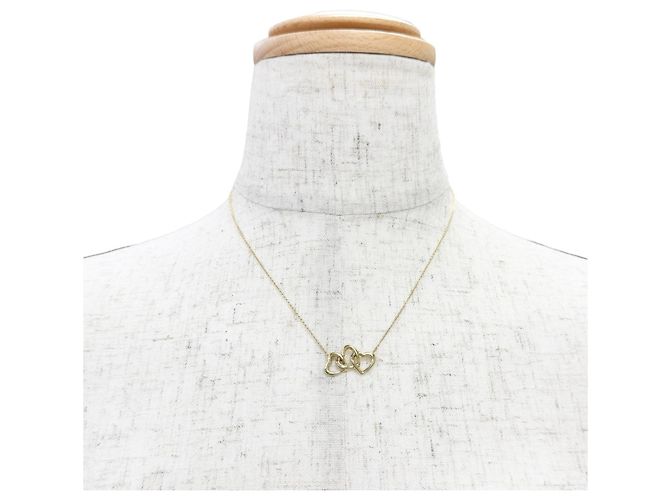 Tiffany & Co Collana Pendente Tiffany Triple Heart D'oro - vista 2