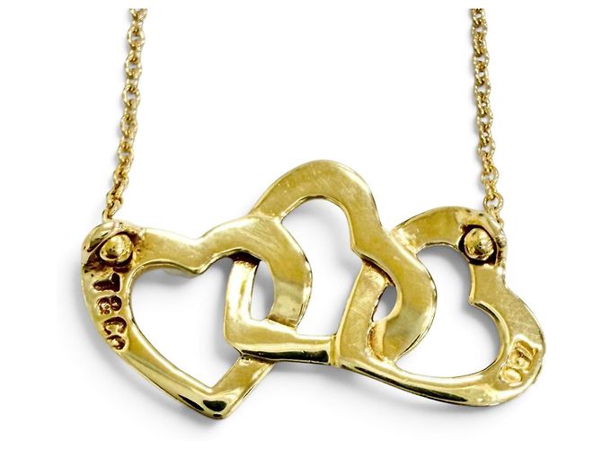 Tiffany & Co Collana Pendente Tiffany Triple Heart D'oro - vista 4