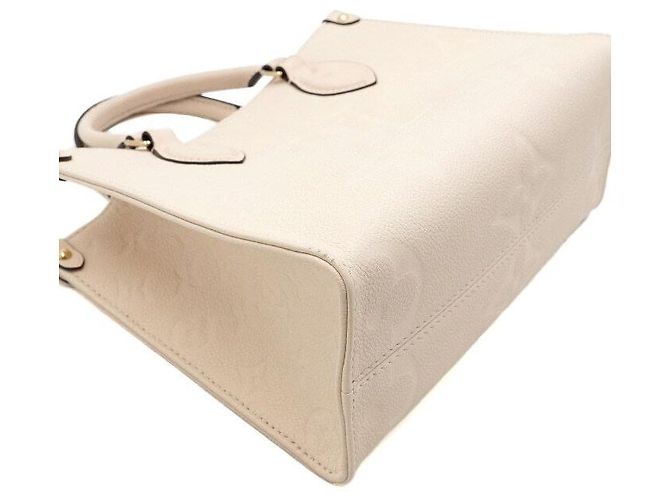 Louis Vuitton Borsa a mano e a tracolla OnTheGo PM Monogram Empreinte Cream Marrone - vista 10