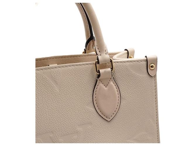 Louis Vuitton Borsa a mano e a tracolla OnTheGo PM Monogram Empreinte Cream Marrone - vista 11