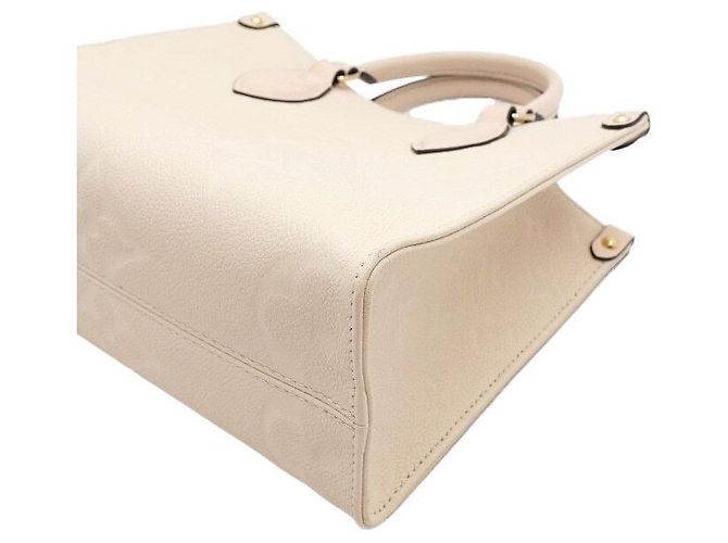 Louis Vuitton Borsa a mano e a tracolla OnTheGo PM Monogram Empreinte Cream Marrone - vista 9
