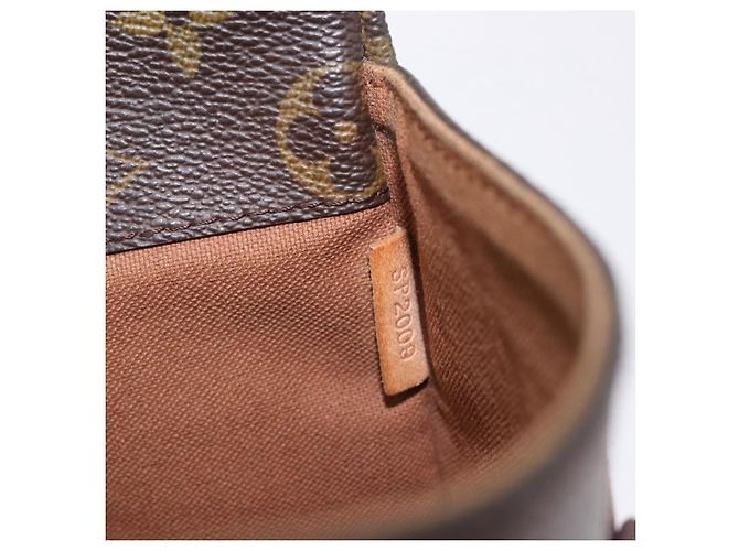 Louis Vuitton Trotteur Beaubourg Monogram Canvas Marrone - vista 7