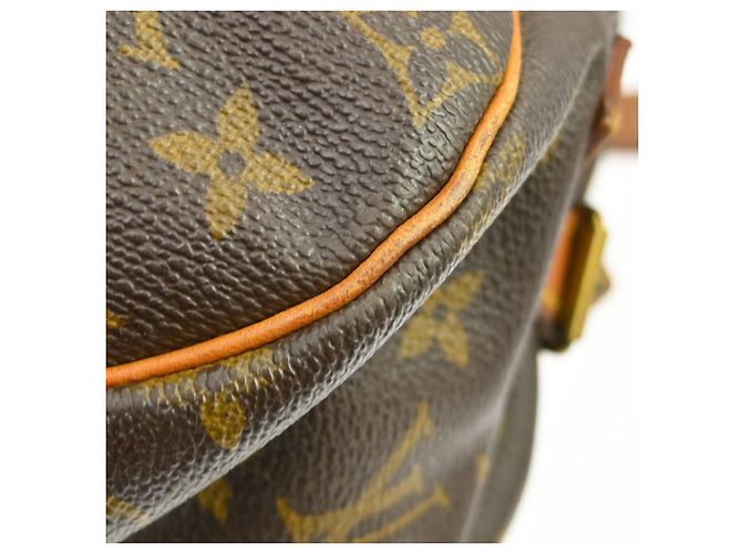 Louis Vuitton Saumur Monogram 35 Marrone - vista 4