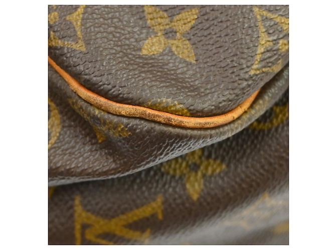 Louis Vuitton Saumur Monogram 35 Marrone - vista 5