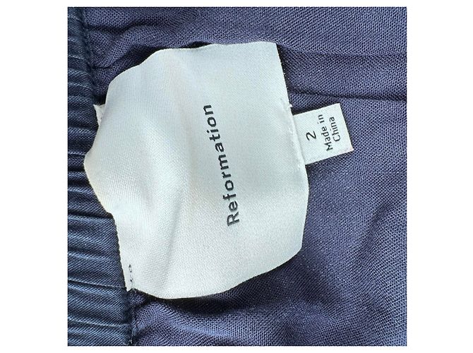 Minifalda de algodón azul marino con borde de encaje Reformation - vista 4