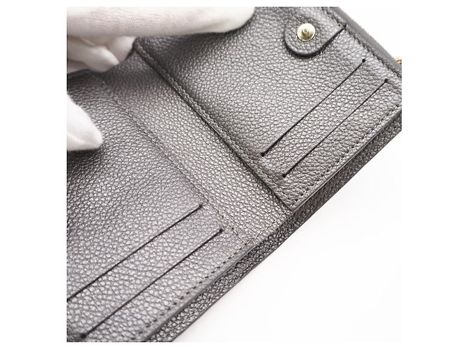 Louis Vuitton Monogram Empreinte Portefeuille Lisa Bi-fold Wallet Argento - vista 13