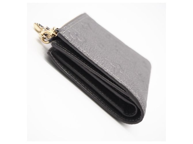 Louis Vuitton Monogram Empreinte Portefeuille Lisa Bi-fold Wallet Argento - vista 9