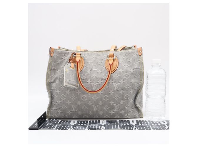 Borsa Louis Vuitton Monogram Denim OnTheGo MM Blu Beige - vista 3