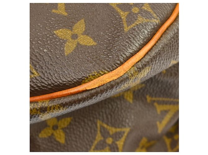 Louis Vuitton Saumur Monogram 35 Marrone - vista 7