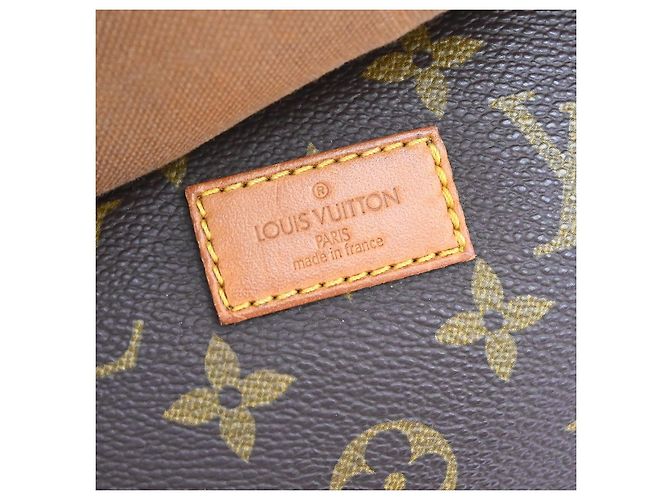 Louis Vuitton Saumur Monogram 35 Marrone - vista 4
