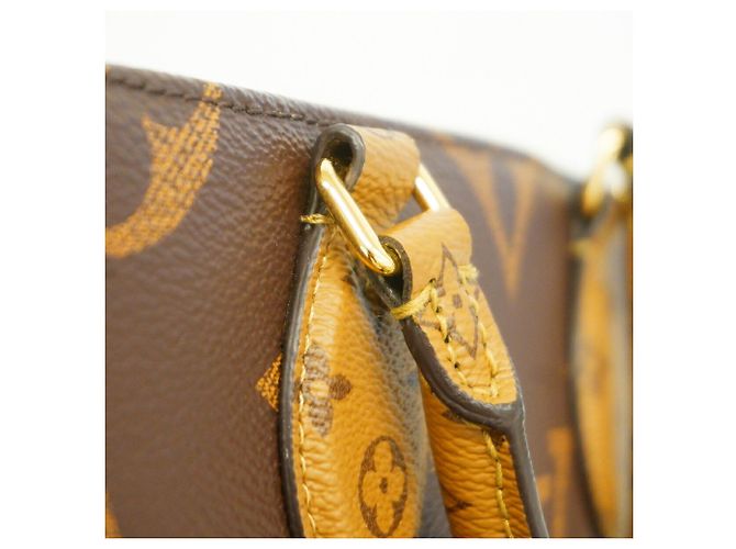 Borsa Louis Vuitton Monogram Giant Reverse OnTheGo EW Marrone - vista 9