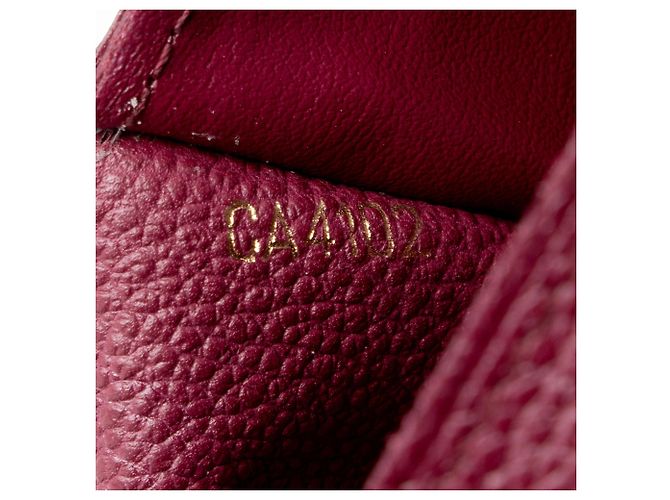 Carteira Curieuse Monogram Empreinte Louis Vuitton Roxo - vista 4