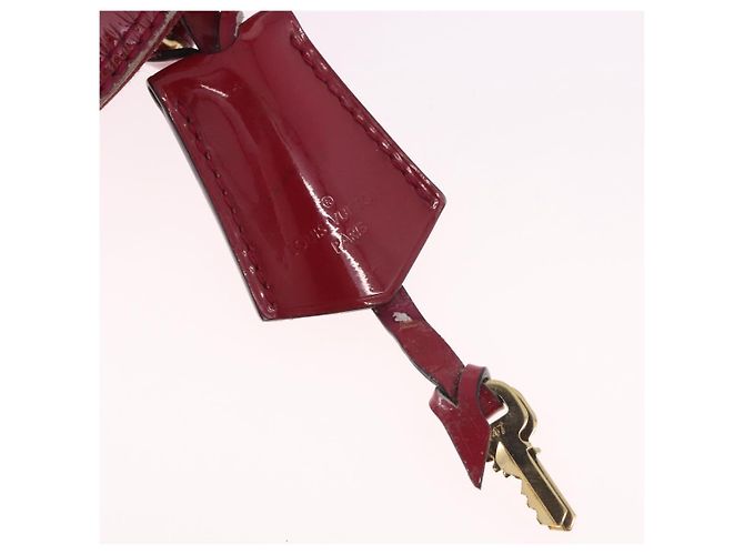 LOUIS VUITTON Monogram Vernis Alma PM Bolsa de Mão Rose Andian M91770 - vista 12
