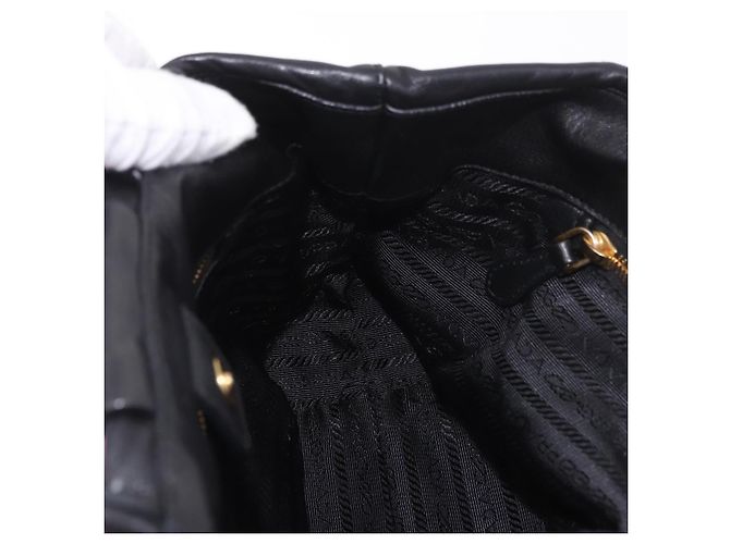 Bolsa de mão PRADA em couro 2way Preta Dourada - vista 22