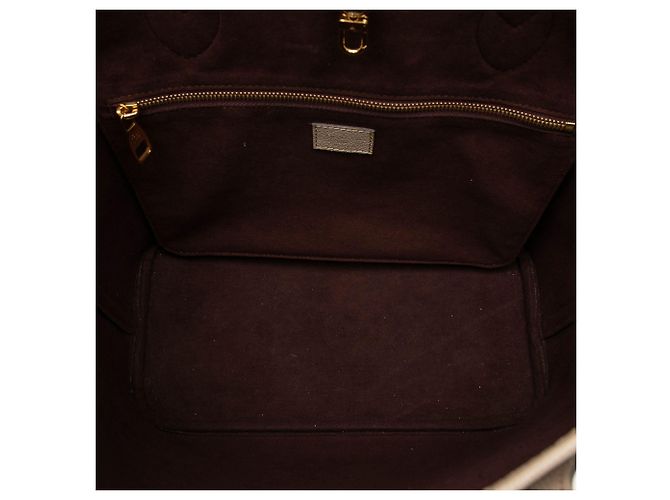 Louis Vuitton Beige Monogram Giant Empreinte Neverfull MM - vista 4