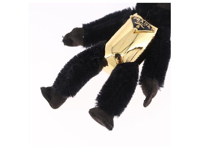Charm Gorilla PRADA in metallo nero e oro Auth 196727M - vista 6