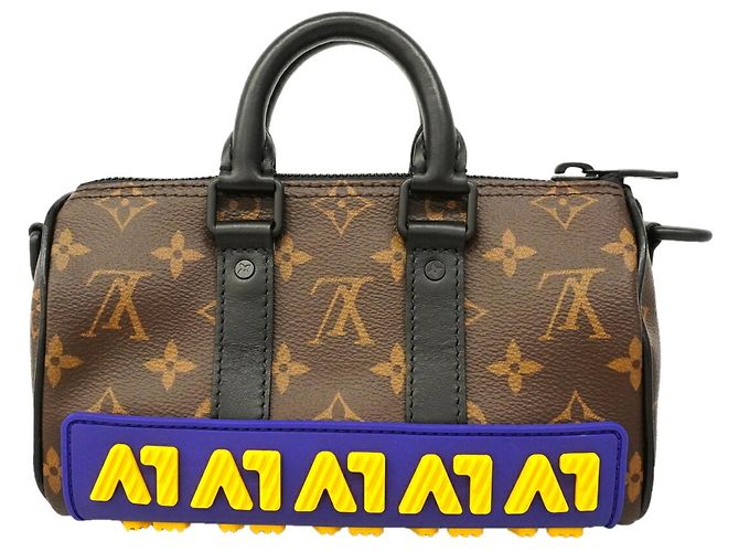 Borsa a mano Louis Vuitton Monogram LV Rubber Keepall XS Marrone - vista 8