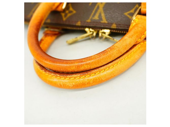 Bolso Louis Vuitton Alma Monogram Castaño - vista 8