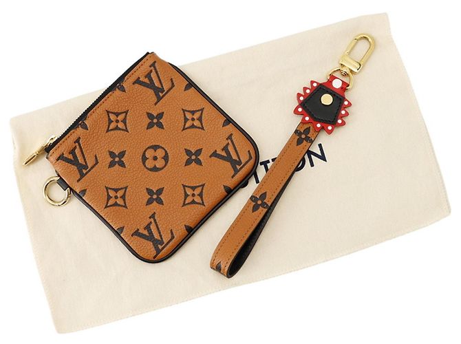 Louis Vuitton Monogram Empreinte Pochette Trio Marrone Nero Crudo - vista 9
