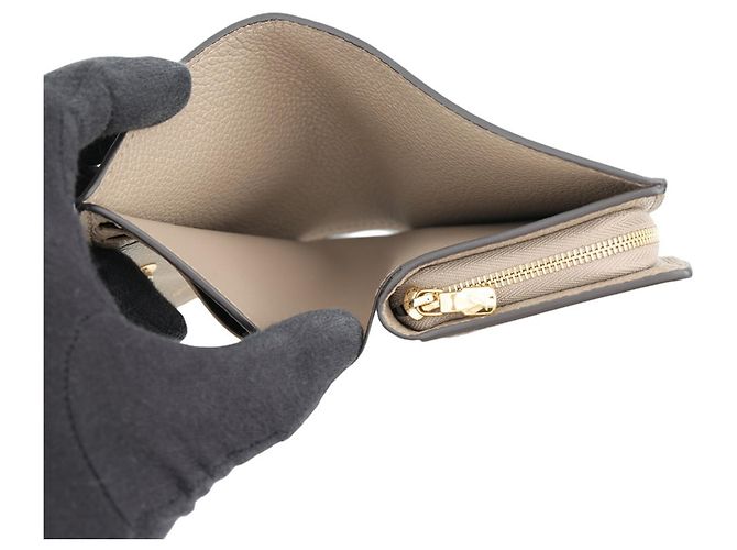 Cartera bi-fold Louis Vuitton en Monogram Empreinte Gris Crudo - vista 5