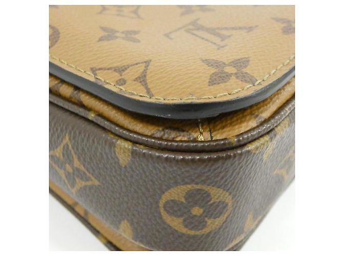 Louis Vuitton Monogram Reverse Pochette Métis MM Marrone - vista 3