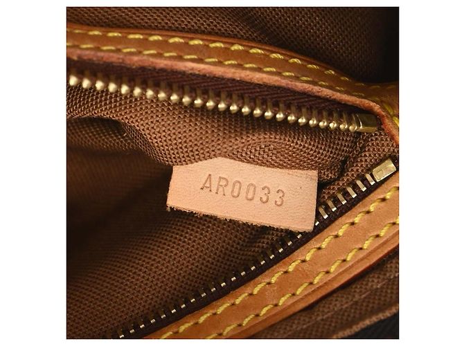 Louis Vuitton Trotteur Monogram Canvas Marrone - vista 5