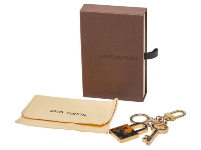 Louis Vuitton Portefeuille Confidence Keychain Marrone D'oro - vista 5
