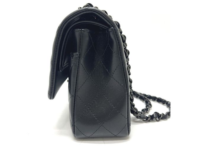 Borsa a tracolla Chanel A01112 Matelassé Nero - vista 3