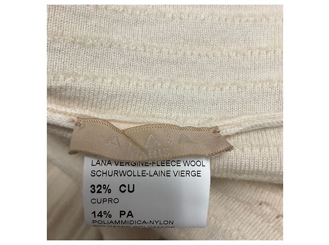 Alaïa Vestido de malha de lã evasê sem mangas com decote em V texturizado creme Alaia Bege - vista 4