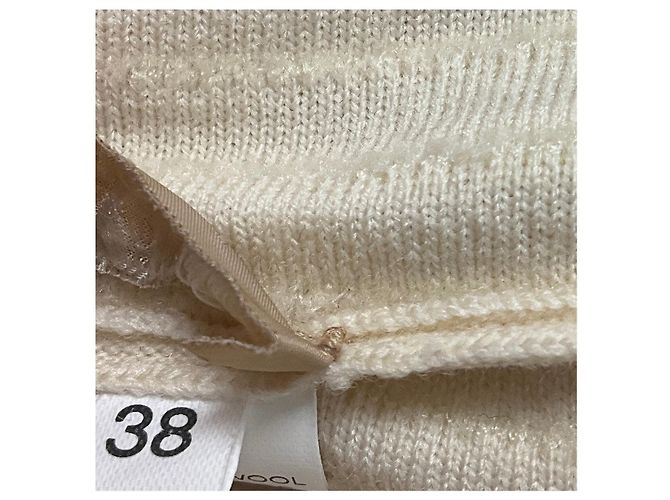 Alaïa Vestido de malha de lã evasê sem mangas com decote em V texturizado creme Alaia Bege - vista 5