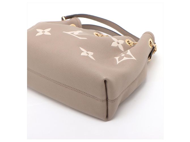 Louis Vuitton Bolsa de ombro e mala LV Bundle em couro Empreinte Bege - vista 3