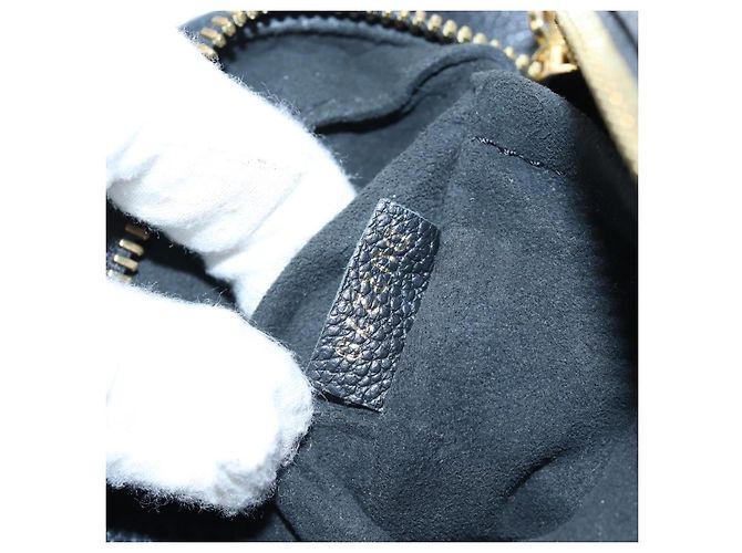 Louis Vuitton Boite Chapeau Souple Monogram Empreinte Leather MM Nero - vista 7
