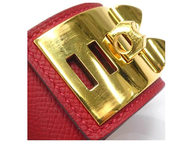 Hermès Bracciale Charm Hermes in Oro e Pelle Rossa Rosso D'oro - vista 6