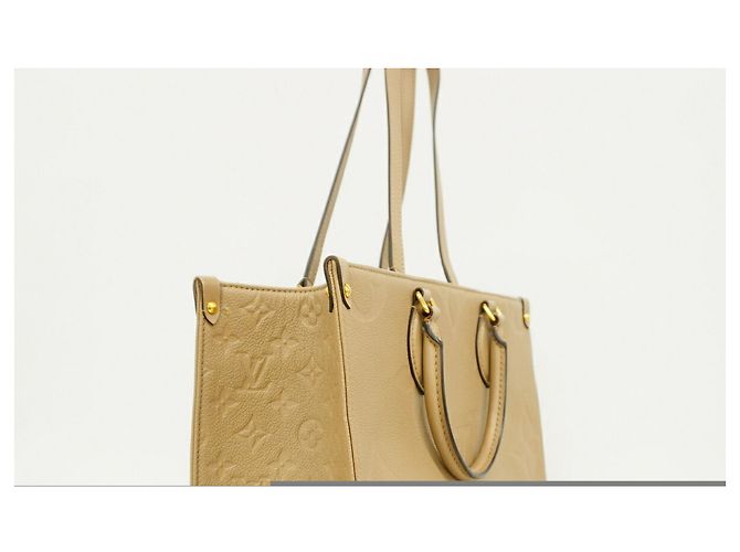Borsa Tote Louis Vuitton Monogram Empreinte OnTheGo MM Grigio - vista 2