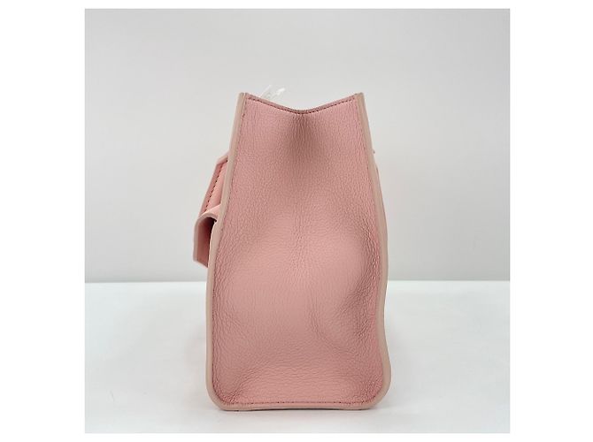 Borsa Louis Vuitton Lockme PM in rosa - vista 3