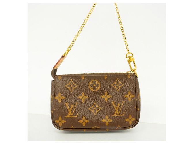 Louis Vuitton Monogram Mini Pochette Accessoires Marrone - vista 6