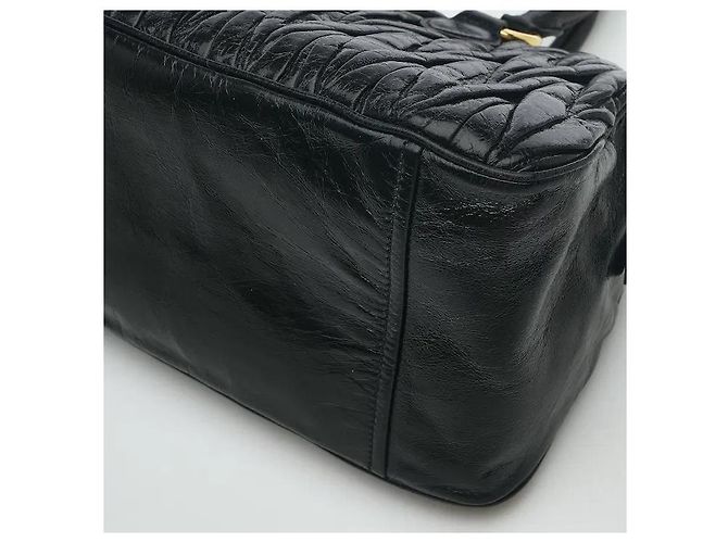 Made using Miu Miu's iconic, sophisticated Matelasse technique, this delivers both a three-dimensional texture and an elegant atmosphere. The soft leather material develops natural charm with use, Black - view 3