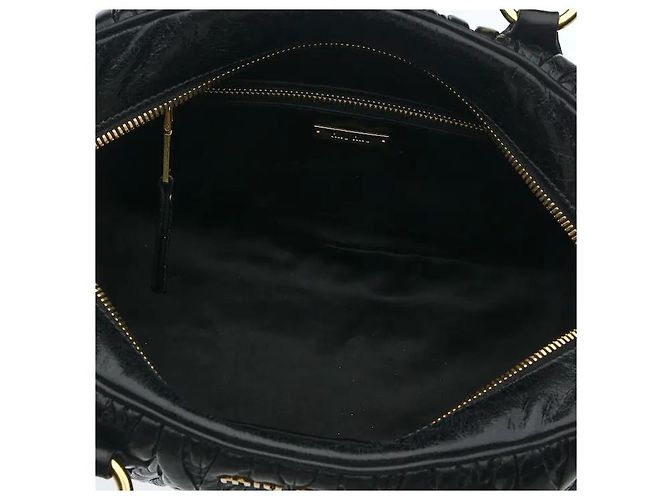Made using Miu Miu's iconic, sophisticated Matelasse technique, this delivers both a three-dimensional texture and an elegant atmosphere. The soft leather material develops natural charm with use, Black - view 8