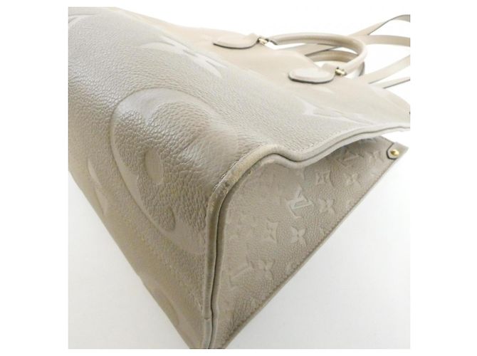Borsa Louis Vuitton Monogram Empreinte OnTheGo MM Grigio - vista 2